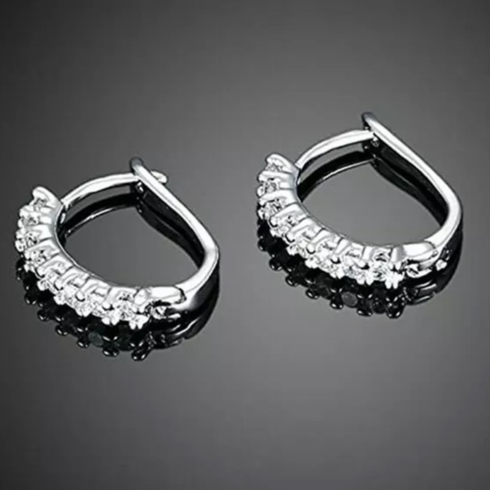New silver tone diamond earrings
